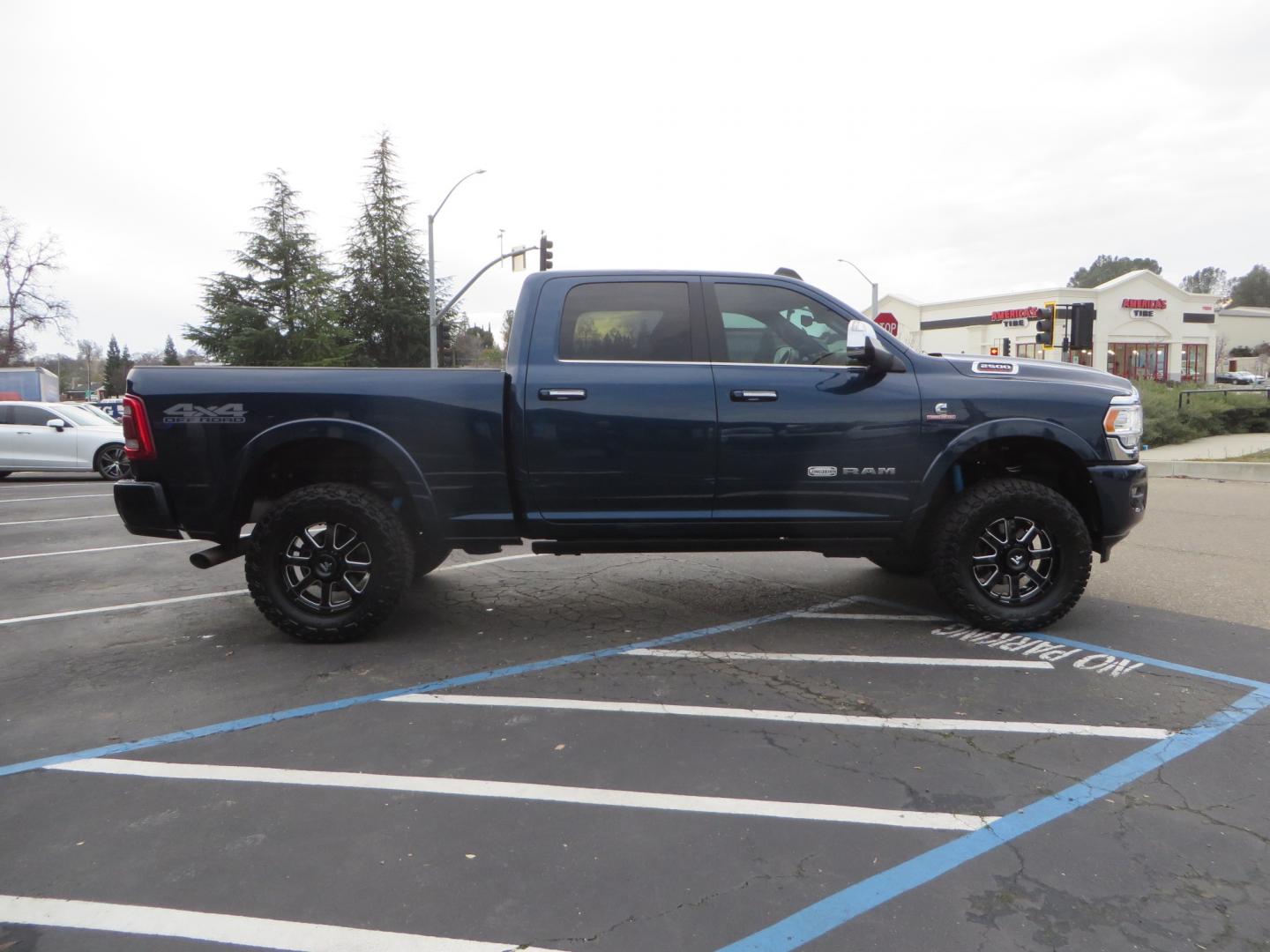 2022 BLUE /BROWN RAM 2500 Limited Longhorn Crew Cab SWB 4WD (3C6UR5GL7NG) with an 6.7L L6 OHV 24V TURBO DIESEL engine, 6A transmission, located at 2630 Grass Valley Highway, Auburn, CA, 95603, (530) 508-5100, 38.937893, -121.095482 - Beautiful Ram Limited Longhorn with a level kit, 20" Fittipaldi wheels, Toyo Open Country RT Trail tires, and a Demco 18K sliding 5th wheel hitch. - Photo#3